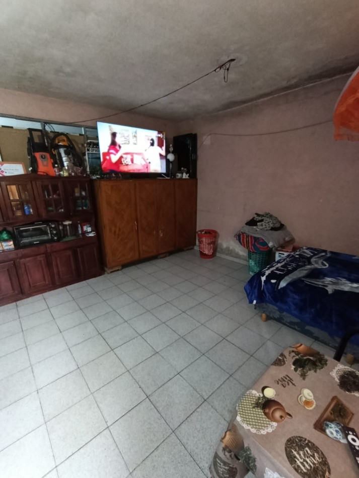 CASA CON LOCAL Y GARAGE !