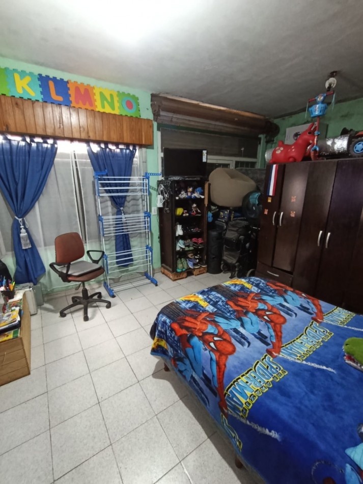 CASA CON LOCAL Y GARAGE !