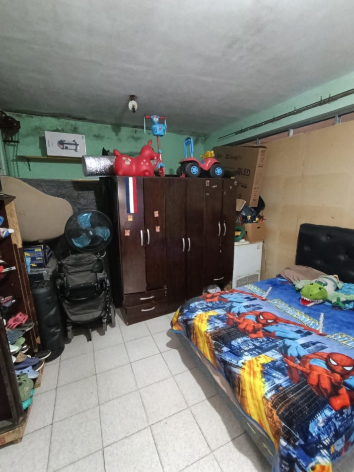 CASA CON LOCAL Y GARAGE !