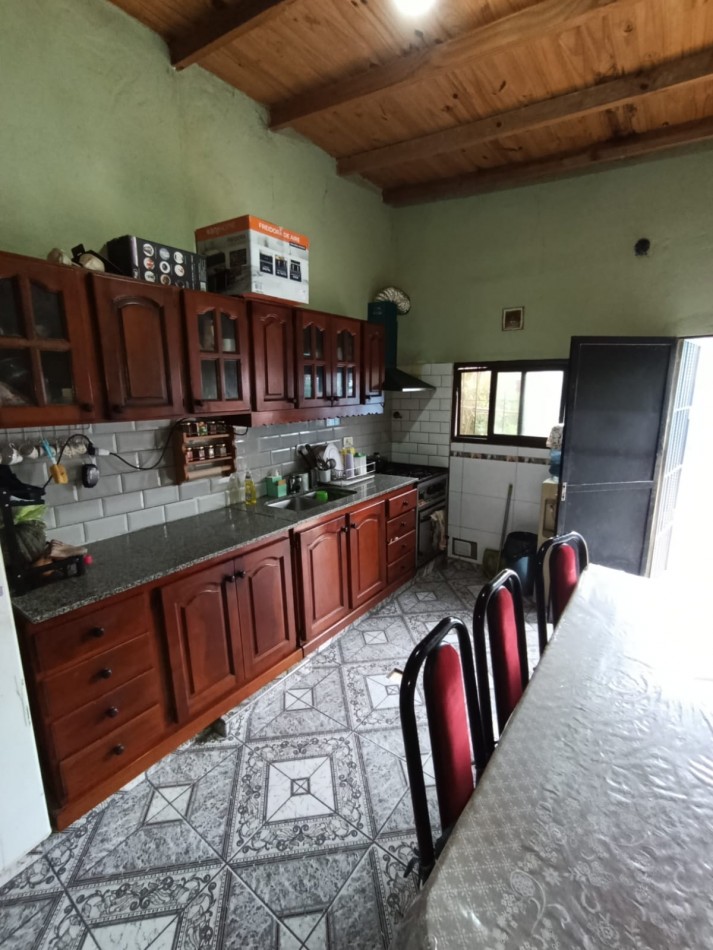 CASA CON LOCAL Y GARAGE !