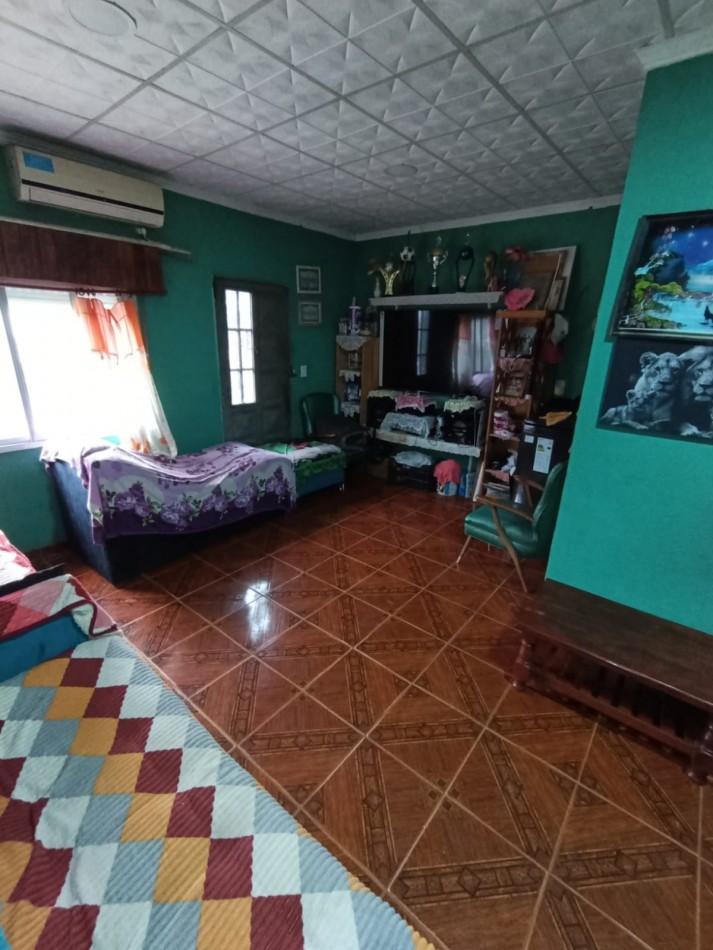 CASA CON LOCAL Y GARAGE !