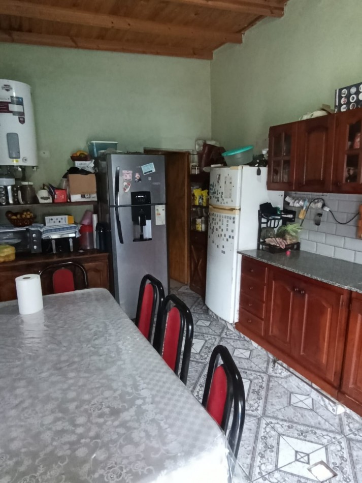 CASA CON LOCAL Y GARAGE !