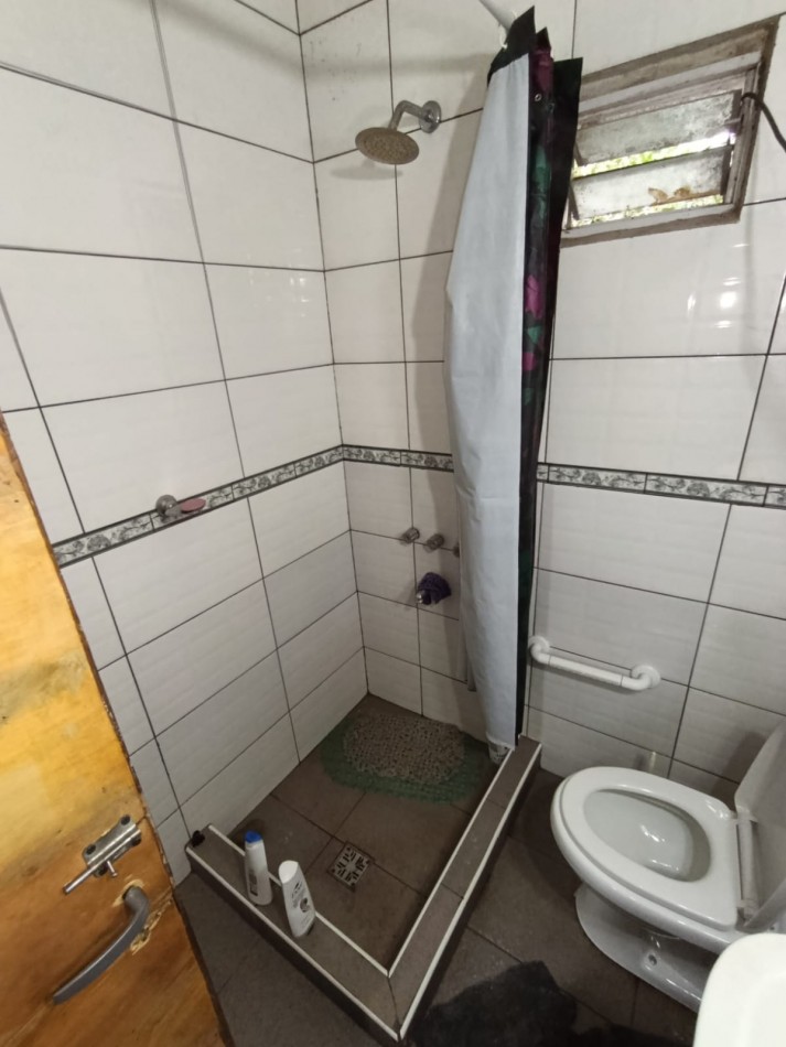 CASA CON LOCAL Y GARAGE !