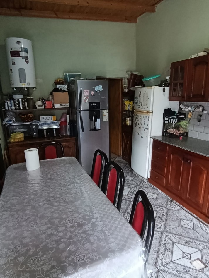 CASA CON LOCAL Y GARAGE !