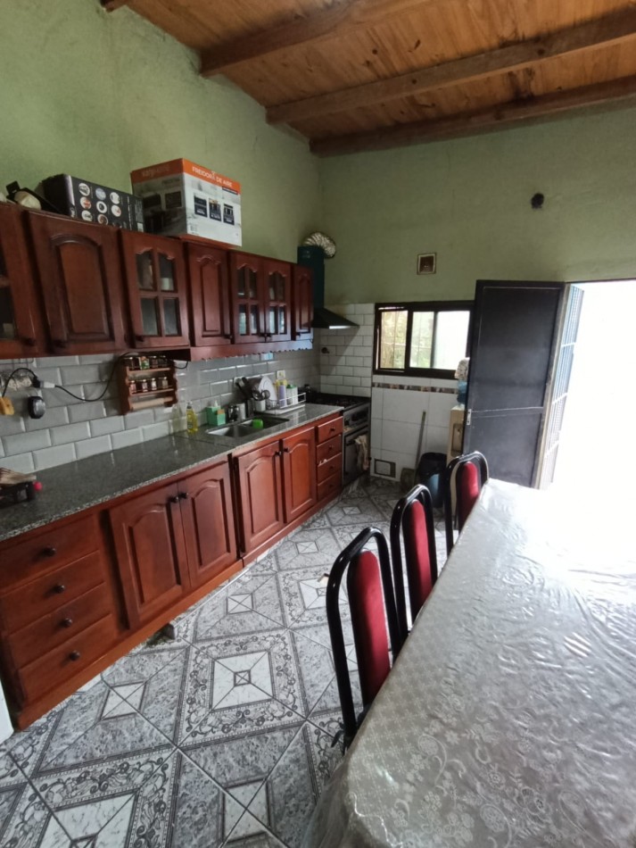 CASA CON LOCAL Y GARAGE !