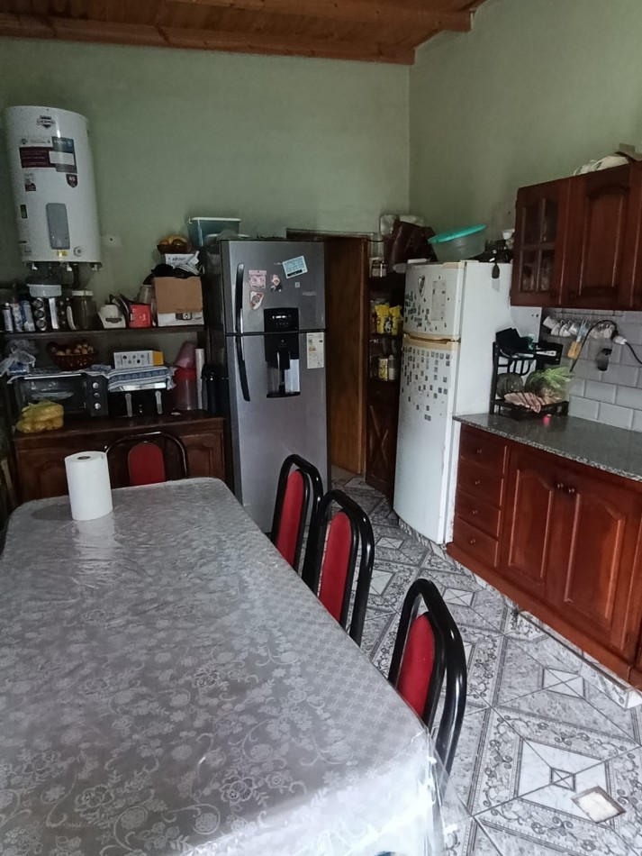 CASA CON LOCAL Y GARAGE !