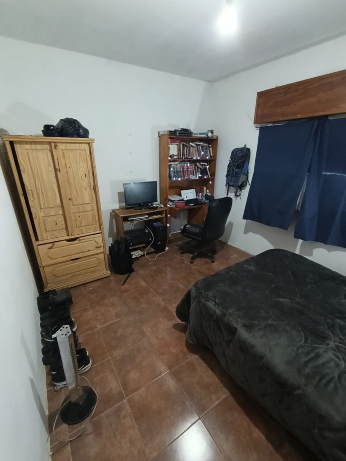 DOS CASAS EN UN LOTE DE TERRENO A METROS DE AV. PTE. PERON.