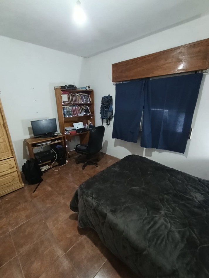 DOS CASAS EN UN LOTE DE TERRENO A METROS DE AV. PTE. PERON.